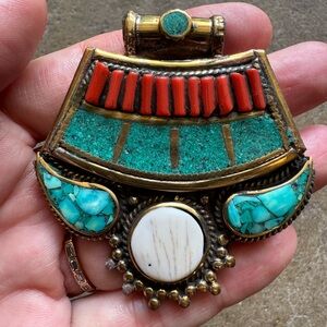 Handmade pendant, Turquoise, coral inlayed in brass.
